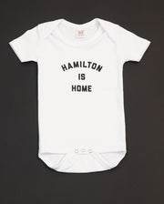 Hamilton is Home Onesie - True Hamiltonian 